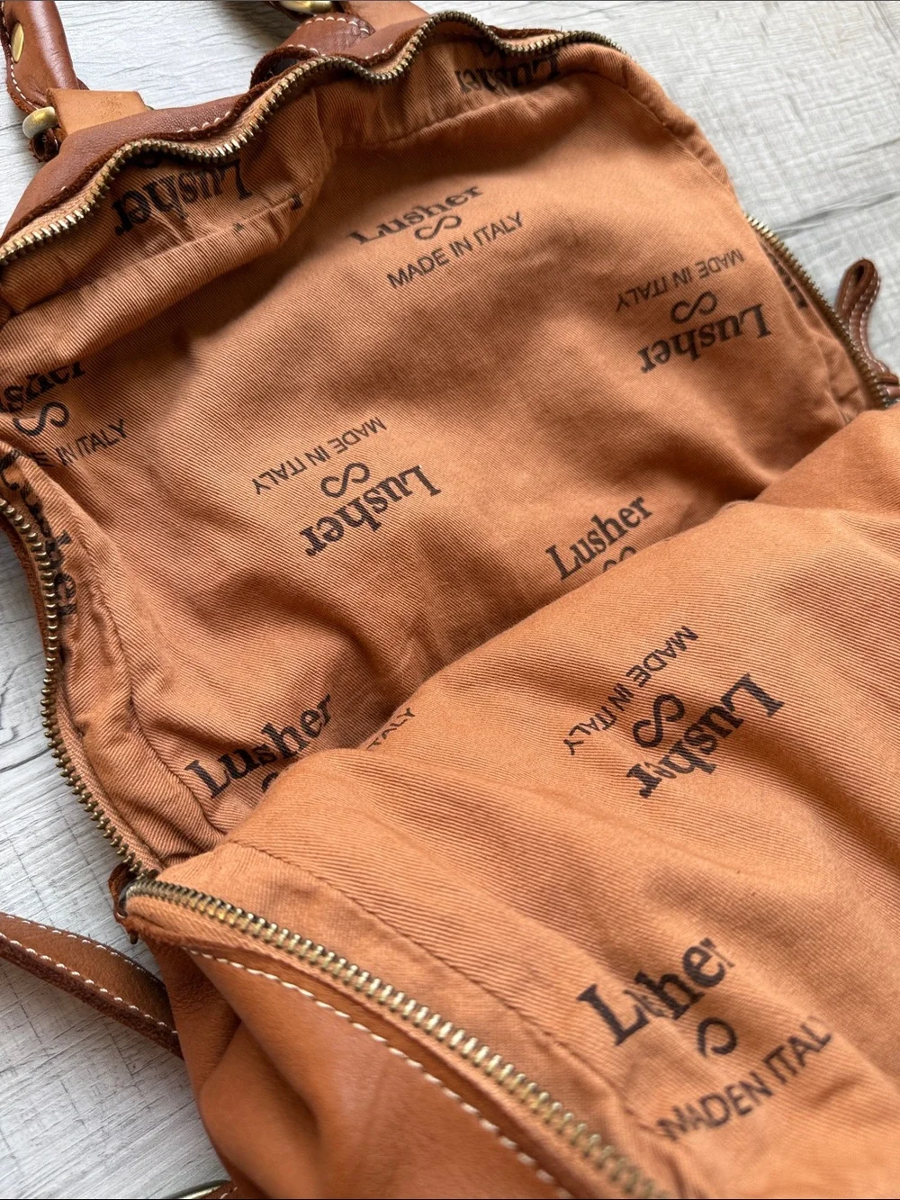 Lusher Stylish Tan Leather Backpack with Brass Accents